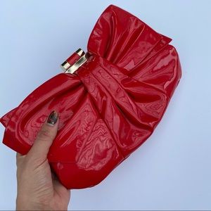 Red latex/vinyl bow clutch